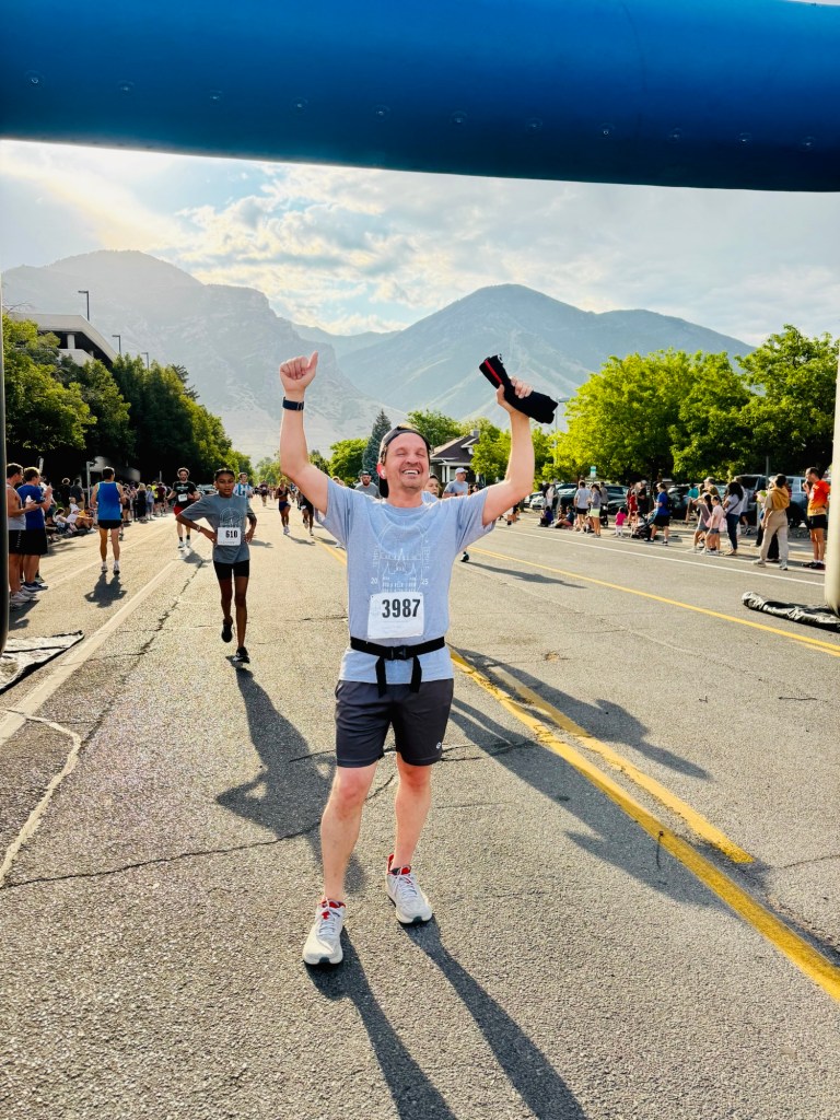 Jared Wilson at the 5K race finish line at the ProvoUtah Temple. 