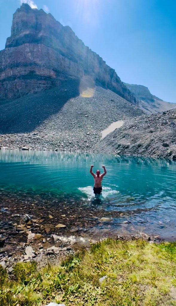Diving into Emerald Lake on the way to the top of Mount Timpanogos 