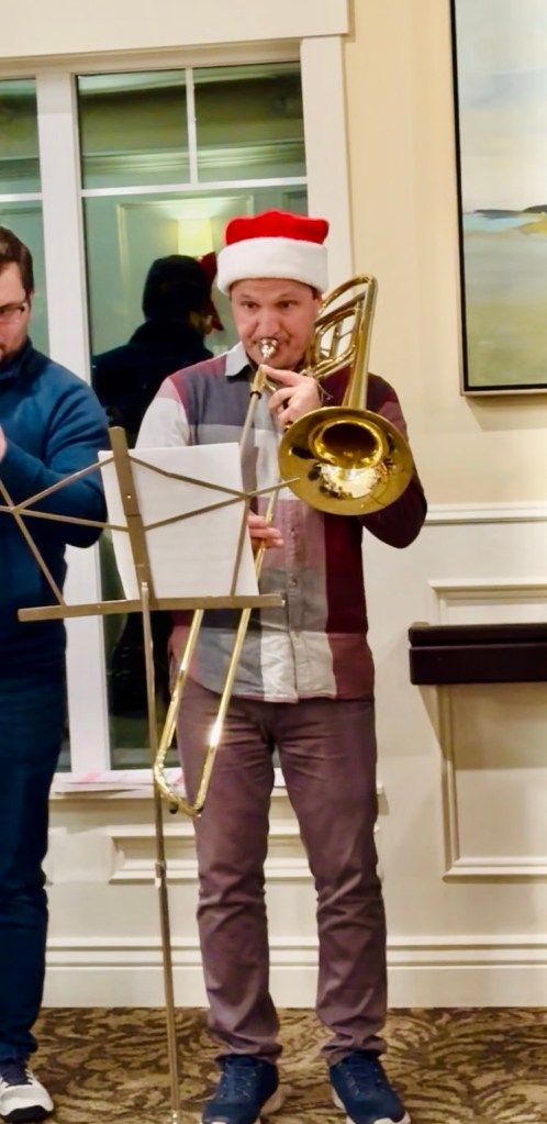 Jared Harding Wilson on Trombone playing the Tuba part in a Brass Ensemble at a rest home/senior living facility here in Utah.