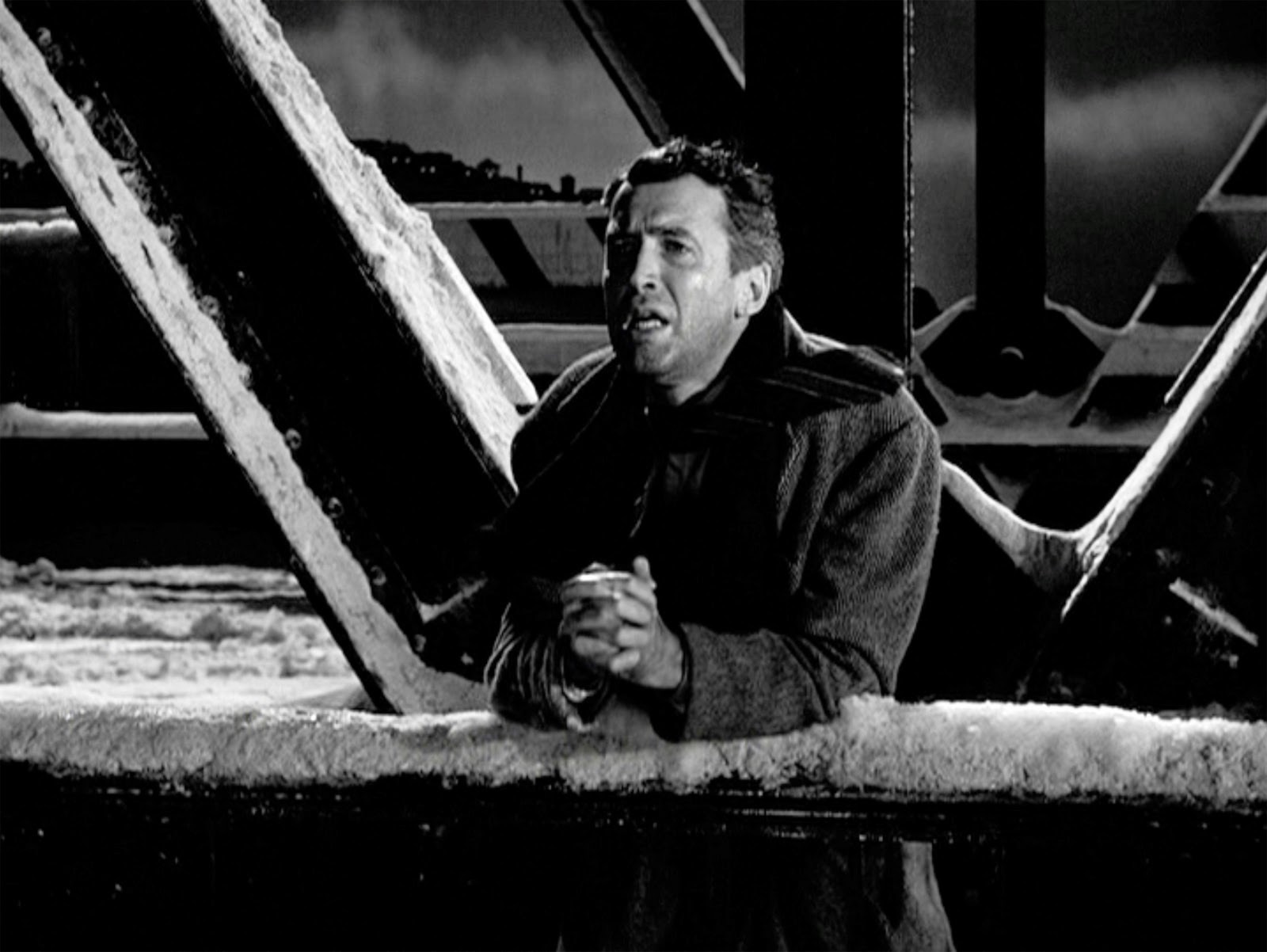 James Stewart as George Bailey Praying for help on the Bridge in the movie, It’s a Wonderful Life