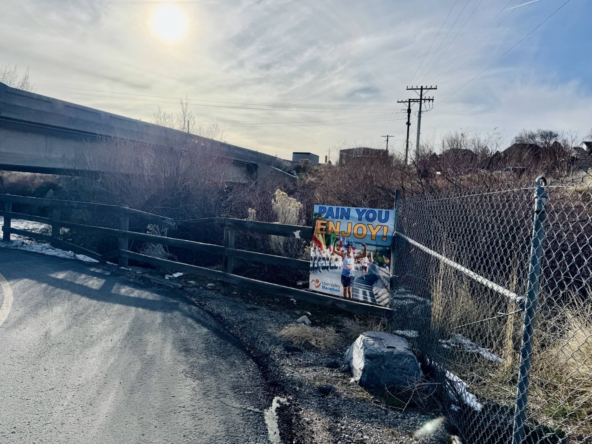A marathon motivational sign under an overpass in Utah, photographed by Jared Harding Wilson.