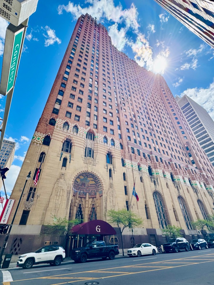 A beautiful wide angle skyline shot of the east side of the Guardian Building on a clear day in Detroit, photographed by Jared Harding Wilson.